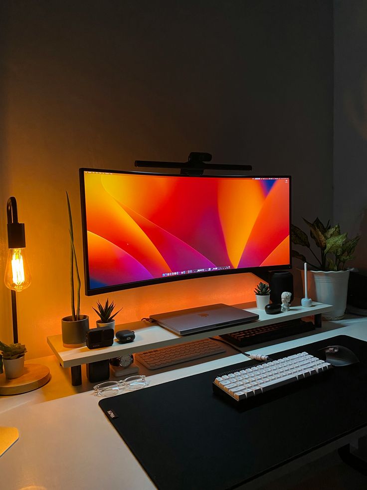 A computer monitor sitting on top of a desk