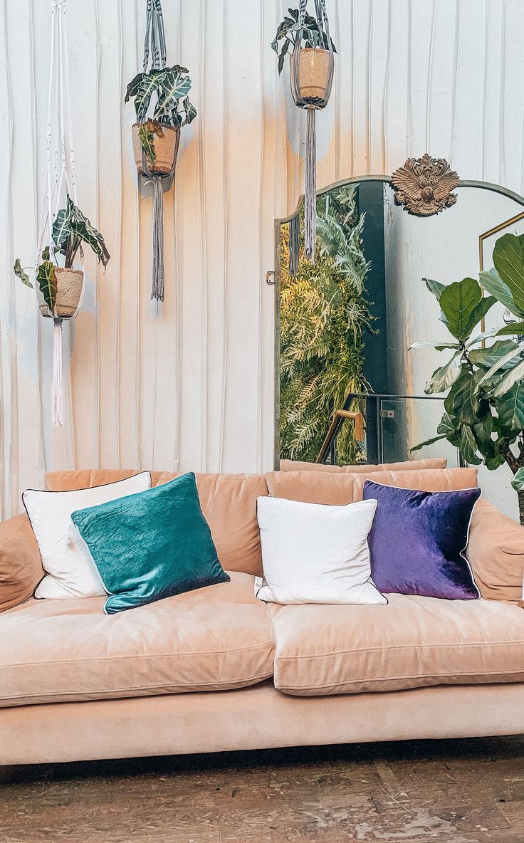 blue throw pillows on white couch